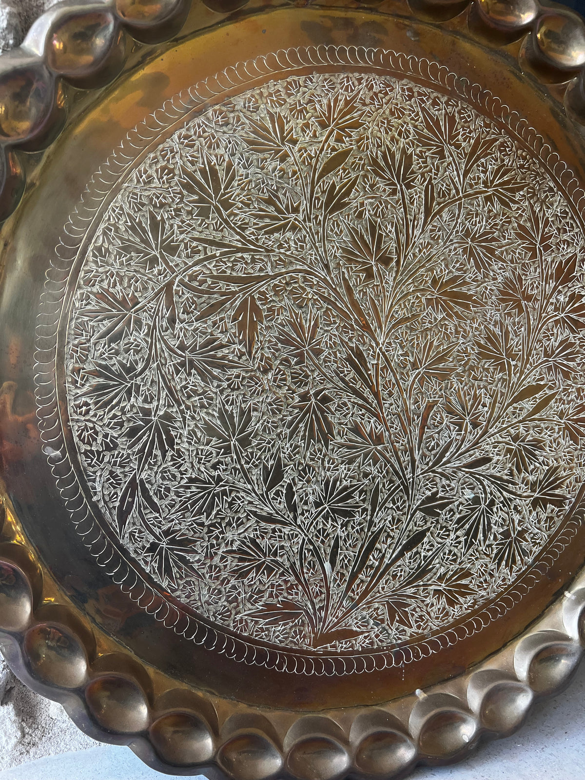 Brass tray, hand-chased foliate design, scalloped rolled edge.