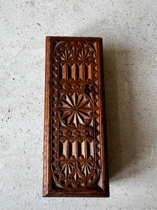     Vintage hand-carved wooden box with geometric rosette design