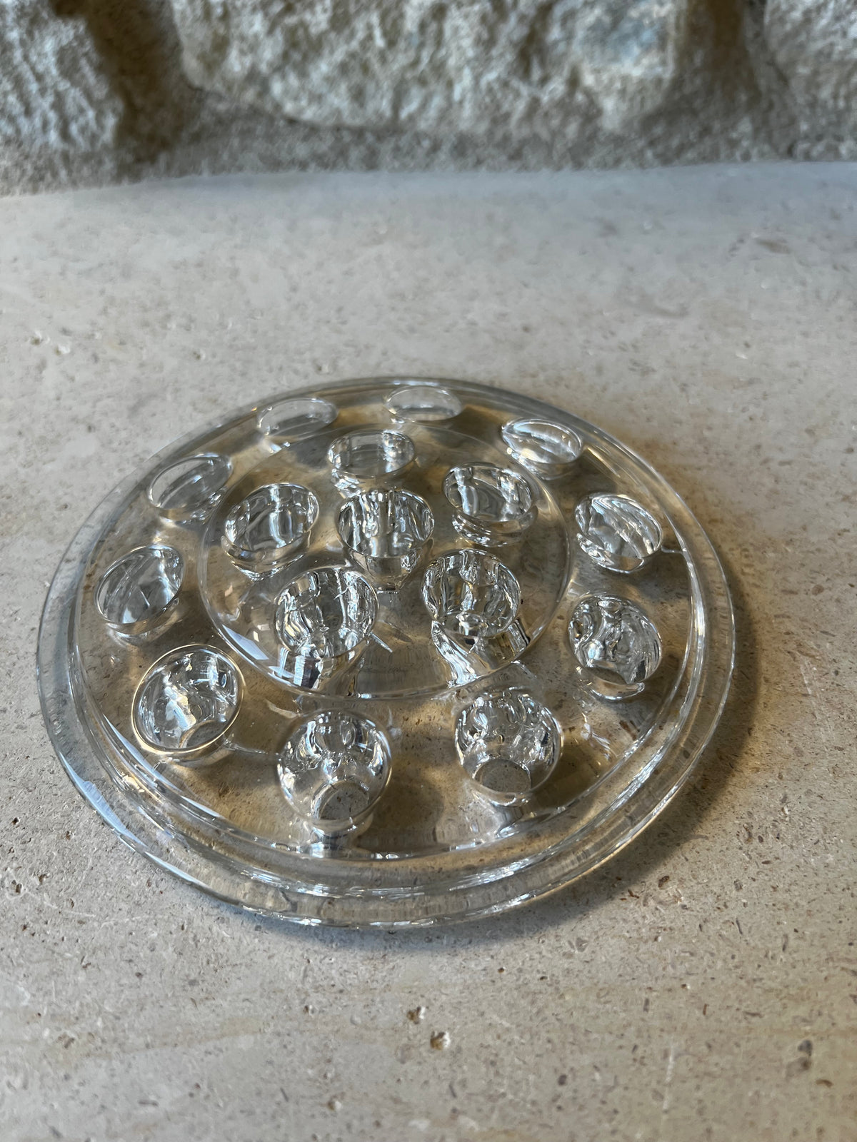 Large round clear pressed glass flower frog, concentric rings of stem holes, flat rim