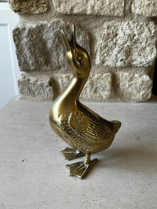 Vintage cast brass goose sculpture with raised neck and open beak